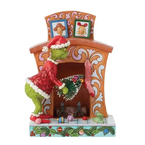 Grinch Pushing Tree Up Fireplace